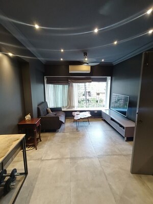 Living Room in 1 BHK Apartment at MK Gracia, Amboli – for Rent