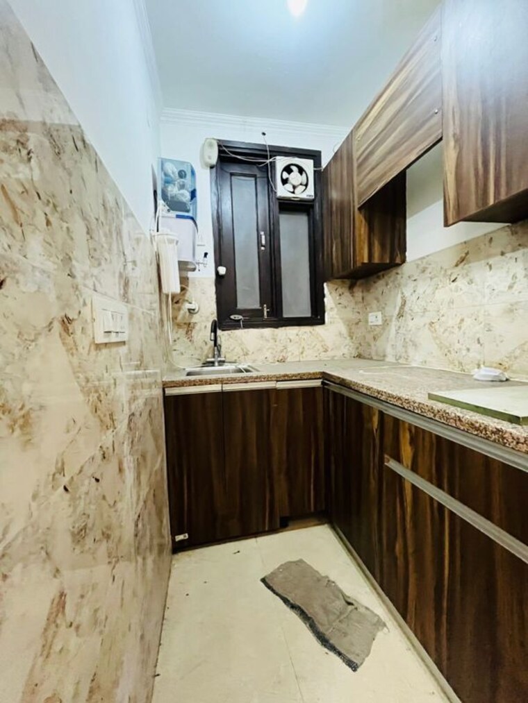 Kitchen, green fields colony 4 Bedroom 450 Sq.Yd. Builder Floor In Green Fields Colony Faridabad 10397681