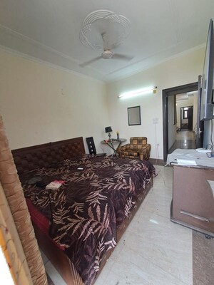 Bedroom in 3 BHK Builder Floor at Green Fields Colony – for Rent