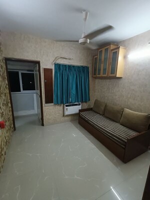 Living Room in 2 BHK Apartment at Chanchal Kalyan Complex, Yari Road – for Rent