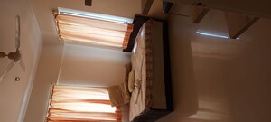 Bedroom in 2 BHK Apartment at Rachana Belvedere Apartment, Aundh – for Rent