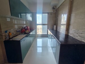 Kitchen in 2 BHK Apartment at Raj Infinia, Malad West – for Rent