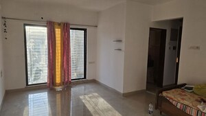 Living Room in 2 BHK Apartment at Tharwani Rosa Bella, Kharghar – for Sale