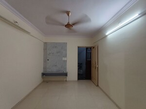 Living Room in 2 BHK Apartment at Aabhirup Apartment, Kopar Khairane – for Rent