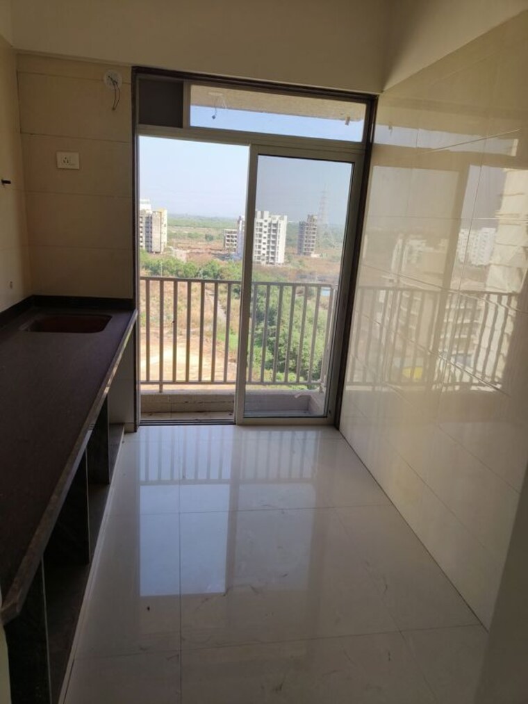 Kitchen, akshar-evita 1 Bedroom 750 Sq.Ft. Apartment In Dronagiri Navi Mumbai 10397808