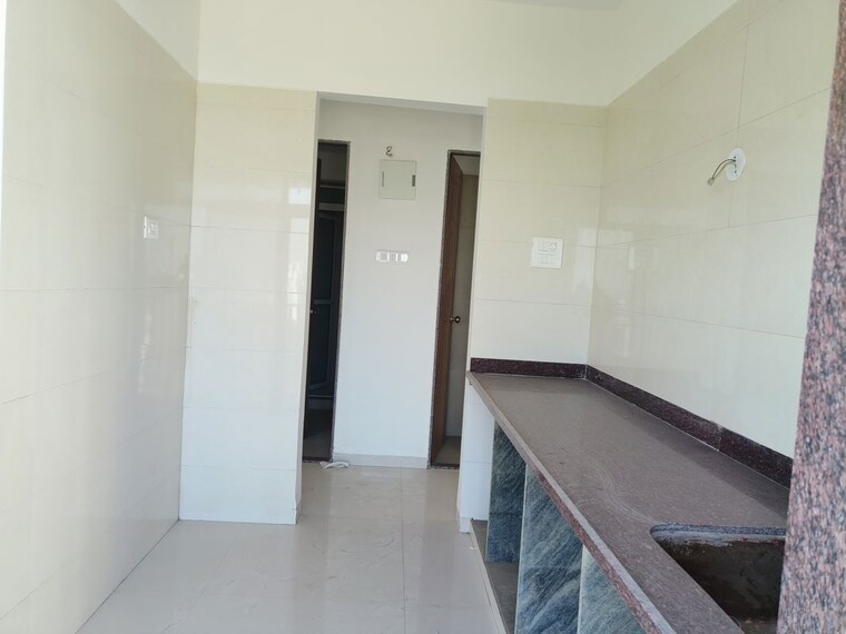 Kitchen, akshar-evita 1 Bedroom 750 Sq.Ft. Apartment In Dronagiri Navi Mumbai 10397808