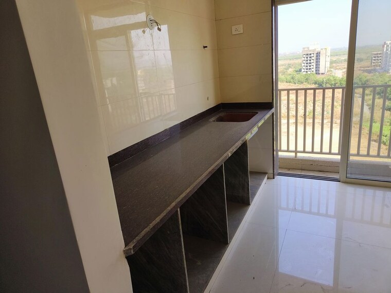 Kitchen, akshar-evita 1 Bedroom 750 Sq.Ft. Apartment In Dronagiri Navi Mumbai 10397808