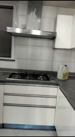 Kitchen in 4 BHK Apartment at Tata Primanti-Executive Apartments, Sector 72 – for Sale