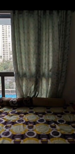 Living Room in 1 BHK Apartment at Runwal Eirene, Balkum Pada – for Rent