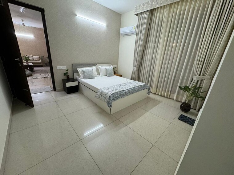 Living Room, maya-green-lotus-saksham 3 Bedroom 1906 Sq.Ft. Apartment In International Airport Road Zirakpur 10397906