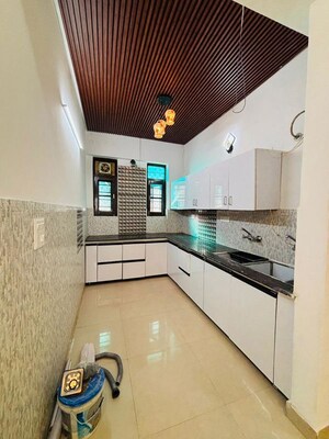 Kitchen in 3 BHK Builder Floor at Guru Nanak Enclave, Dhakoli – for Sale
