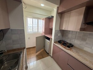Kitchen in 2 BHK Apartment at Monarch Aqua, Kr Puram – for Rent