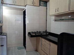 Kitchen in 2 BHK Apartment at Kamla Airbus, Andheri East – for Rent