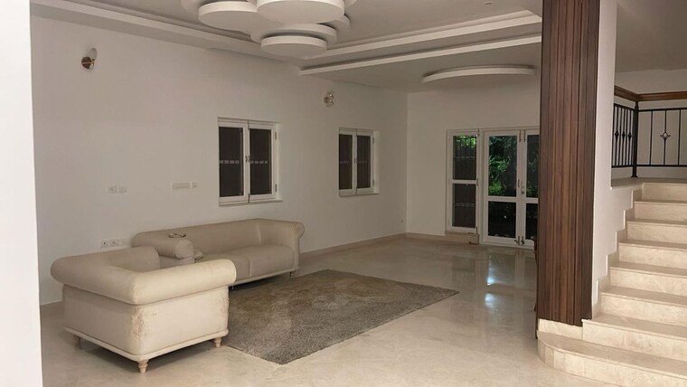 Living Room, prestige-augusta-golf-village 4 Bedroom 4300 Sq.Ft. Villa In Kothanur Bangalore 10398222