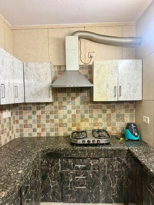 Kitchen in 2 BHK Builder Floor at Kailash Colony – for Rent
