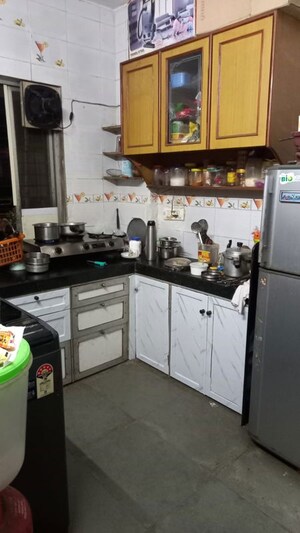 Kitchen in 2 BHK Apartment at Nav Man Mandir CHS, Borivali West – for Sale