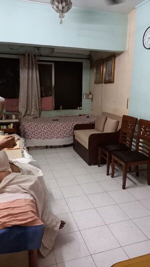 Bedroom in 2 BHK Apartment at Nav Man Mandir CHS, Borivali West – for Sale