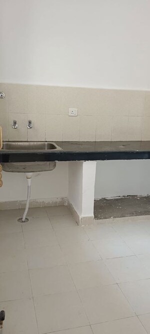 Kitchen in 2 BHK Apartment at Proview Officer City, Raj Nagar Extension – for Rent