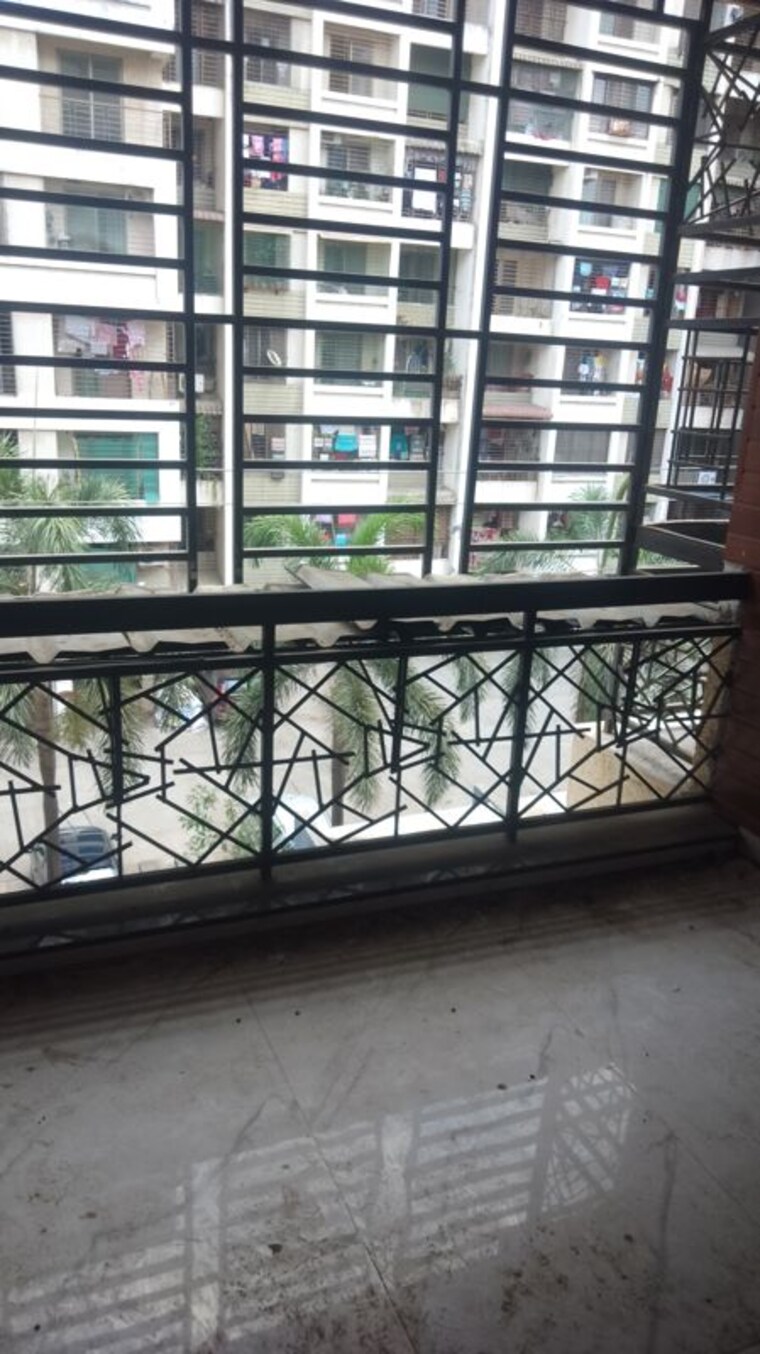 Balcony, om-siddhivinayak-residency 2 Bedroom 834 Sq.Ft. Apartment In Titwala Thane 10398456
