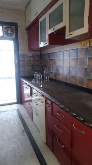 Kitchen in 2 BHK Apartment at Om Siddhivinayak Residency, Titwala – for Rent