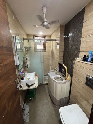 Bathroom in 3 BHK Builder Floor at Rajouri Garden – for Sale