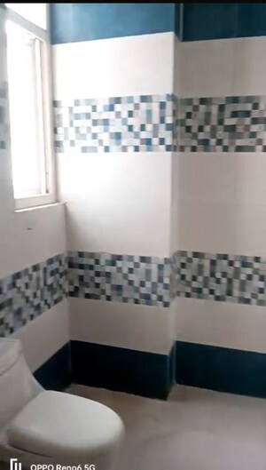 Bathroom in 2 BHK Apartment at Grah Avas Green View Heights, Raj Nagar Extension – for Rent