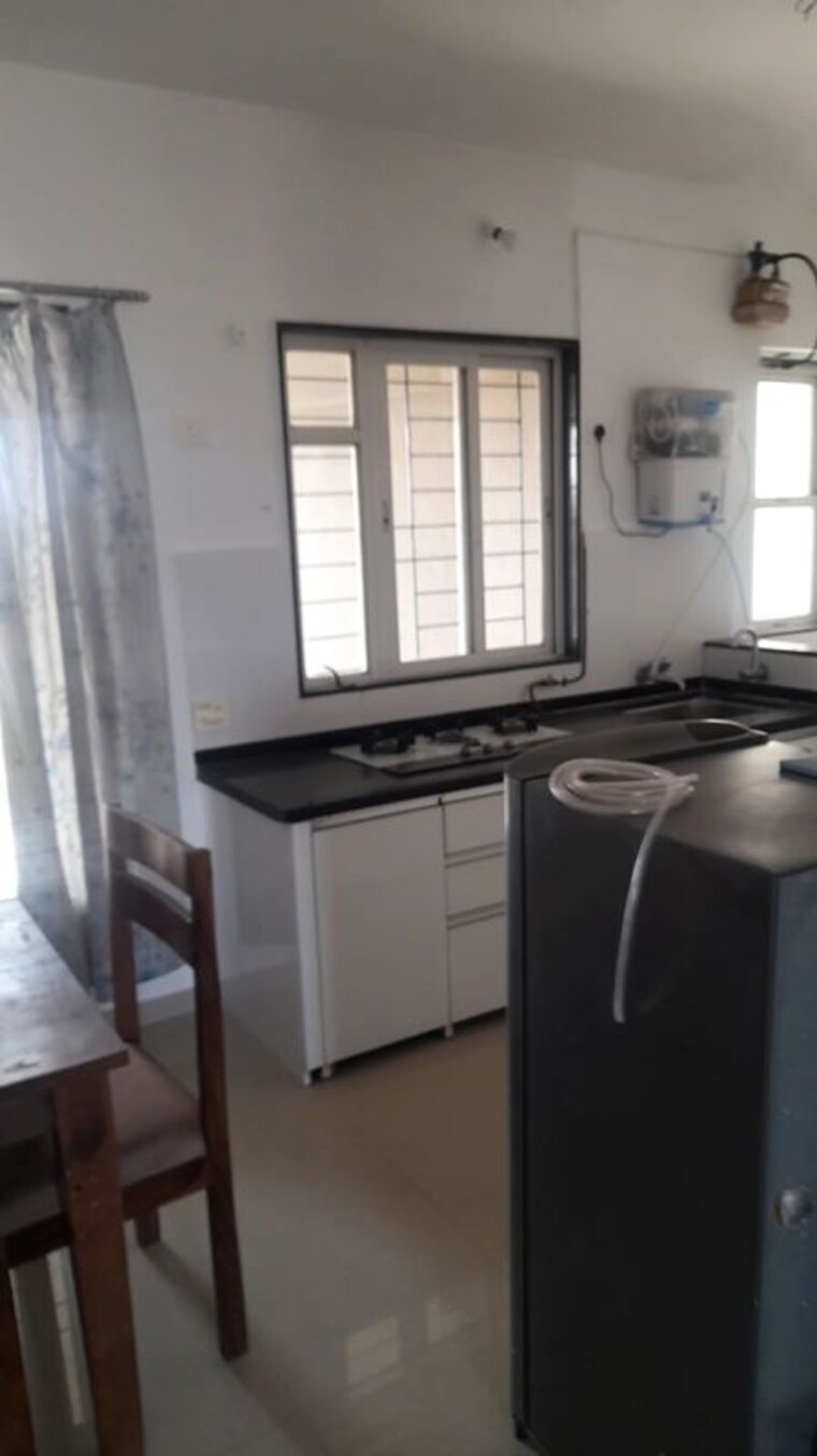 Kitchen, eminent-spaces-aura-solis 2 Bedroom 1200 Sq.Ft. Apartment In Wanwadi Pune 10398493
