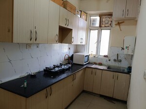 Kitchen in 3.5 BHK Apartment at Sikka Karmic Greens, Sector 78 – for Rent