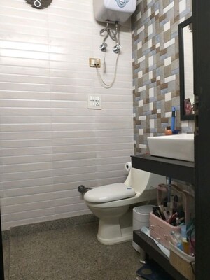 Bathroom in 3 BHK Builder Floor at Rajouri Garden – for Sale