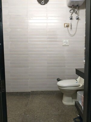Bathroom in 3 BHK Builder Floor at Rajouri Garden – for Sale