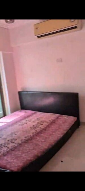 Bedroom in 3 BHK Apartment at Apraulic Sterling Court Wing D, Andheri East – for Rent