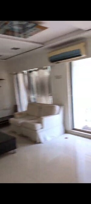 Living Room in 3 BHK Apartment at Apraulic Sterling Court Wing D, Andheri East – for Rent