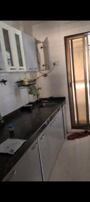 Kitchen in 3 BHK Apartment at Apraulic Sterling Court Wing D, Andheri East – for Rent