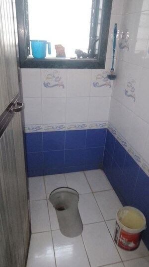 Bathroom in 1 RK Apartment at Gayatri Dham CHS, Titwala – for Rent