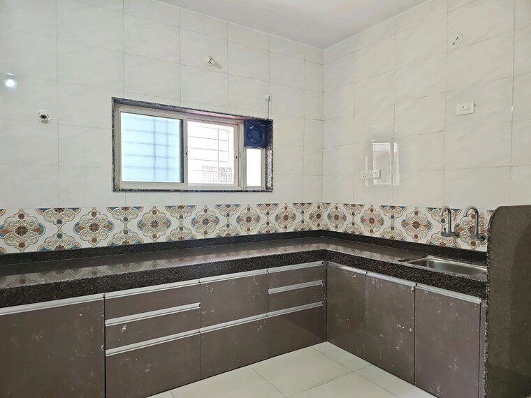 Kitchen, wadgaon sheri 2 Bedroom 720 Sq.Ft. Apartment In Wadgaon Sheri Pune 10398732