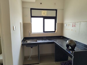Kitchen in 1 BHK Apartment at Runwal Gardens, Dombivli East – for Rent