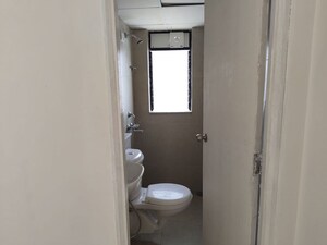Bathroom in 1 BHK Apartment at Runwal Gardens, Dombivli East – for Rent