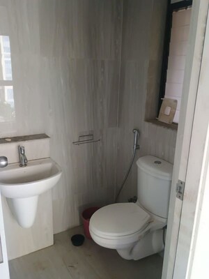 Bathroom in 2 BHK Apartment at Runwal Gardens, Dombivli East – for Rent