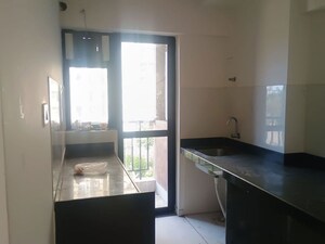 Kitchen in 2 BHK Apartment at Runwal Gardens, Dombivli East – for Rent