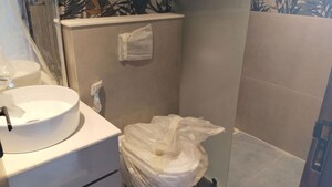 Bathroom in 3 BHK Apartment at Sector 6 Dwarka – for Rent