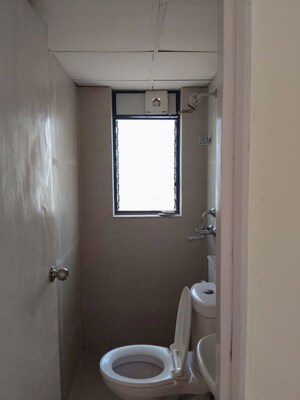 Bathroom in 2 BHK Apartment at Runwal Gardens, Dombivli East – for Rent