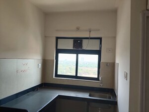 Kitchen in 2 BHK Apartment at Runwal Gardens, Dombivli East – for Rent