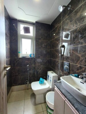 Bathroom in 1 RK Apartment at Mahindra Aura, Sector 110a – for Rent