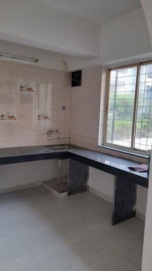 Kitchen in 2 BHK Apartment at Pimple Nilakh – for Sale