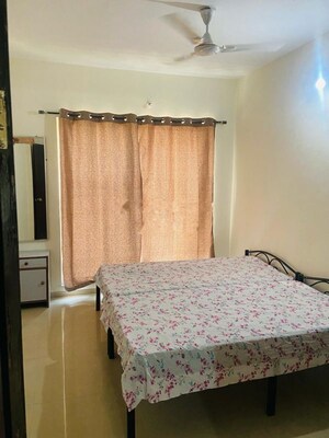 Bedroom in 2 BHK Apartment at Ajax Global Lifestyle, Kharadi – for Rent