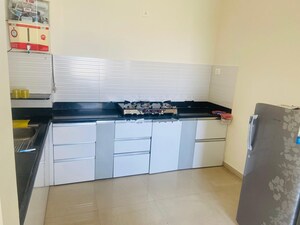 Kitchen in 2 BHK Apartment at Ajax Global Lifestyle, Kharadi – for Rent