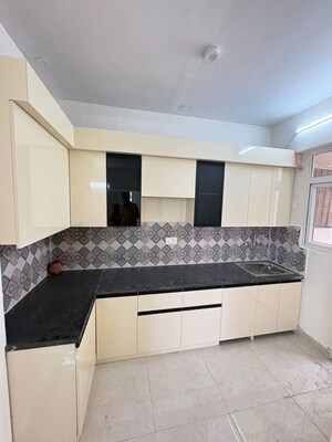 Kitchen in 2 BHK Apartment at Signature The Millennia 3, Sector 37d – for Rent