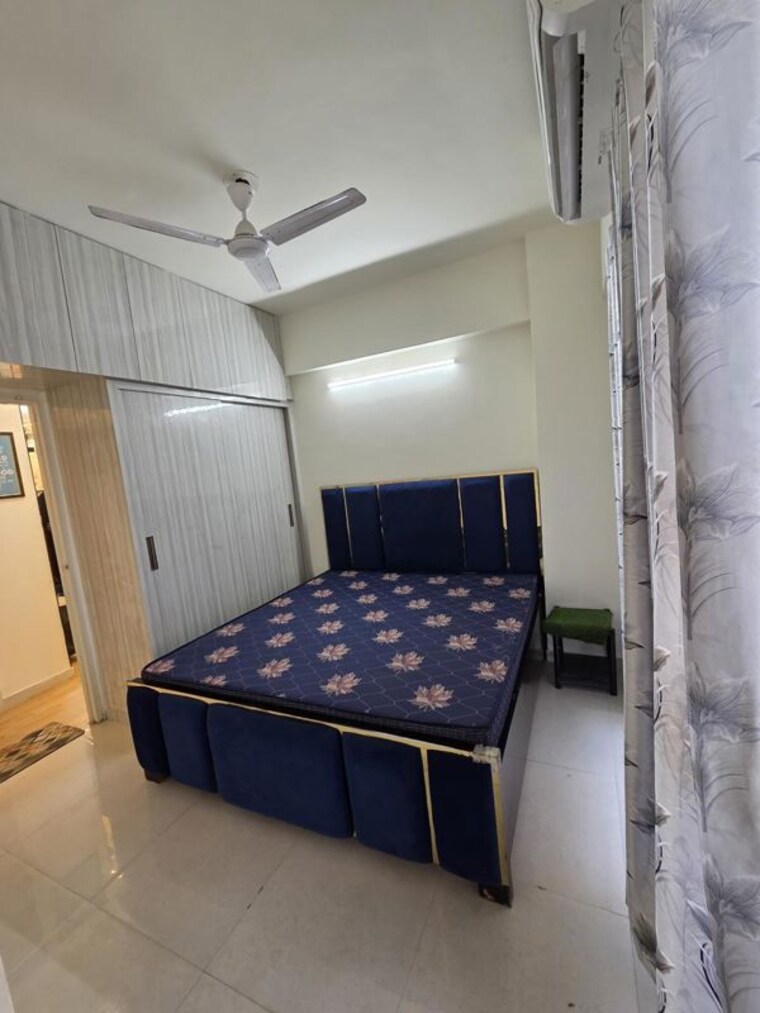 Bedroom, signature-global-the-millennia 2 Bedroom 1000 Sq.Ft. Apartment In Sector 37d Gurgaon 10399205