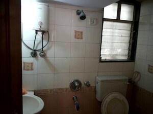 Bathroom in 2 BHK Apartment at Romell Diva, Malad West – for Rent