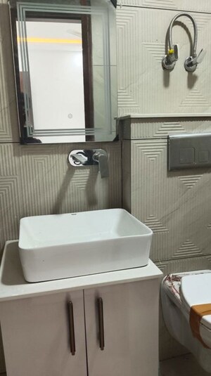 Bathroom in 3 BHK Apartment at Sector 6 Dwarka – for Rent
